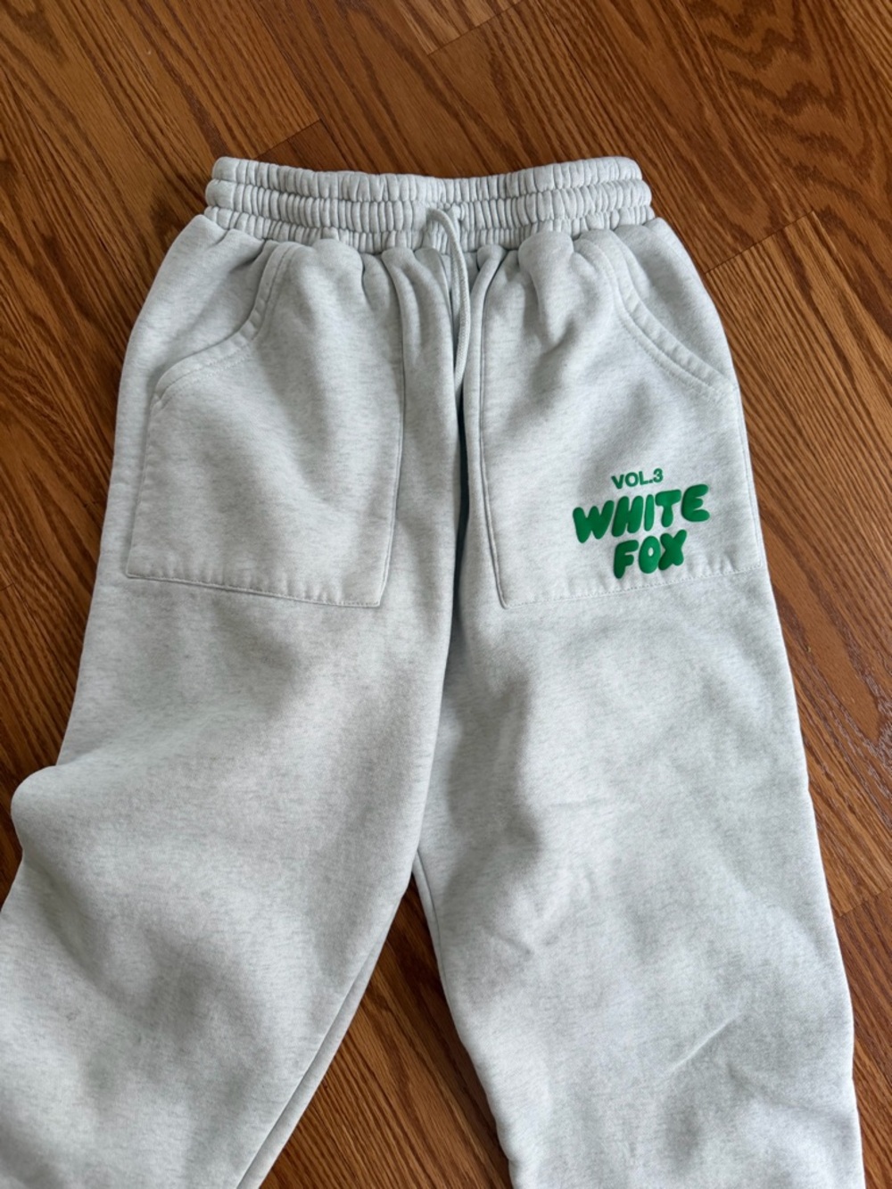 Light Gray Sweatpants with Green Logo